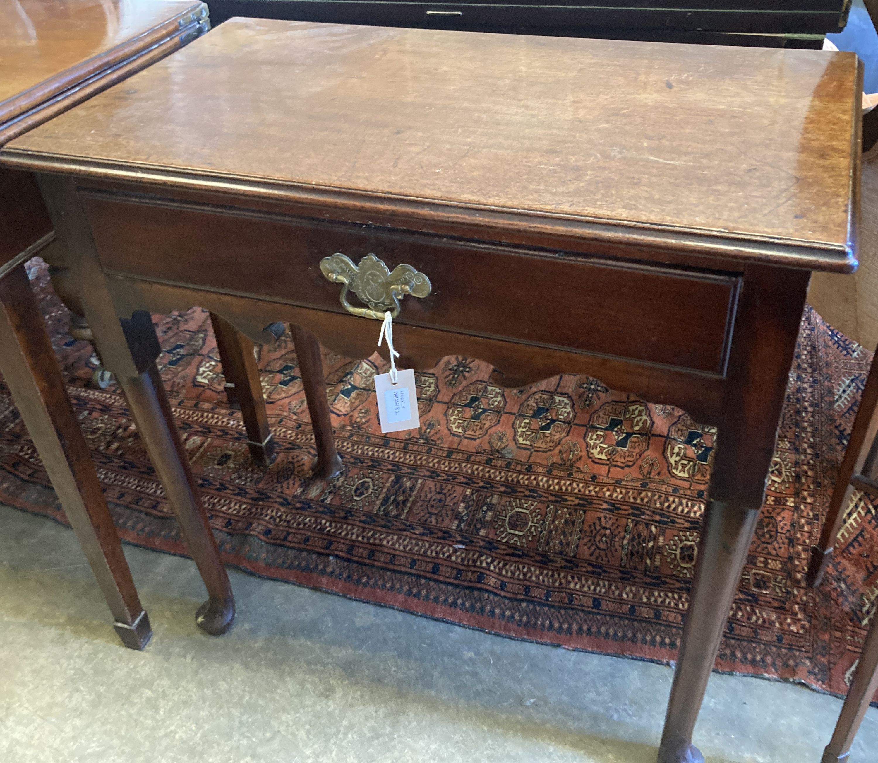 A George II mahogany side table fitted drawer on plain turned legs and pad feet, width 70cm, depth 39cm, height 71cm